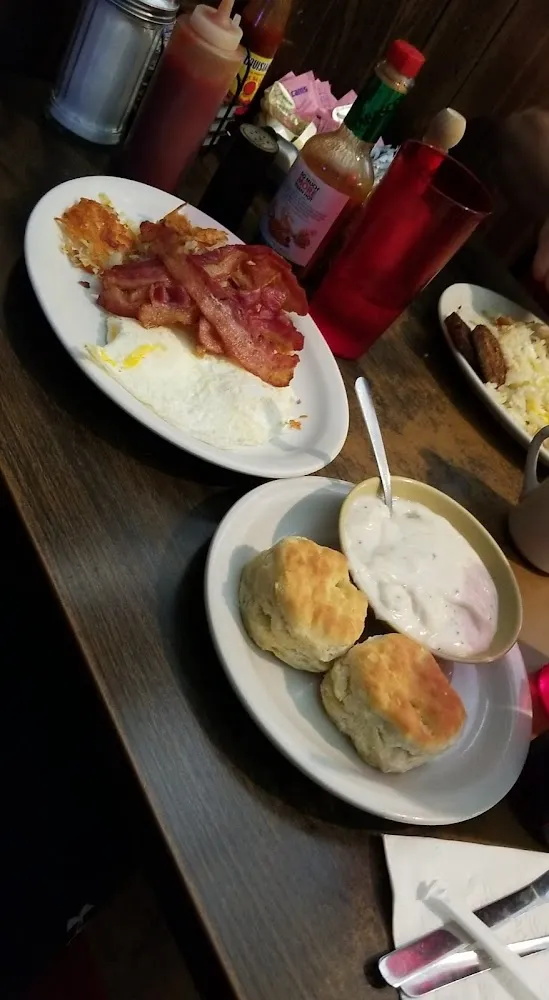 Eggs Bacon Hashbrowns Biscuits and Gravy